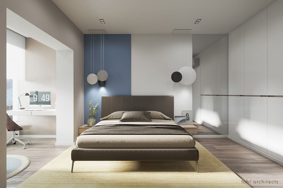طراحی داخلی اتاق خواب مدرن با تخت پارچه ای قهوه ای که از تعادل نامتقارن در شکل های مستطیلی و گرد در آن استفاده شده است
